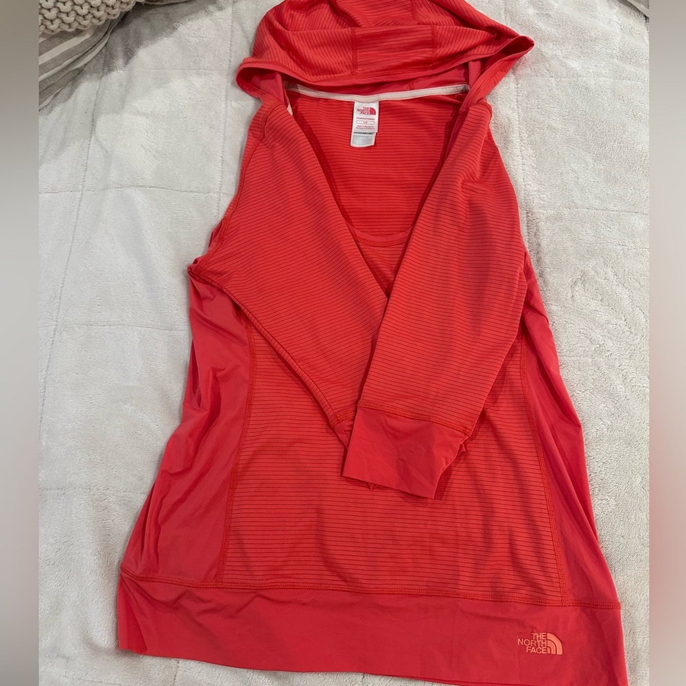 The North Face women’s shell hooded pullover, 3/4 sleeve, coral color.